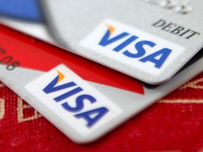 Visa credit cards are displayed in Washington in this October 27, 2009 file photo. (REUTERS/Jason Reed/File)