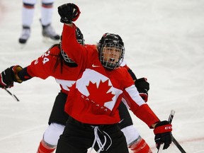 Canada's Meghan Agosta, seen here celebrating what turned out to be the game-winning goal against the U.S. at the Sochi Winter Olympics, is back with the team at the Four Nations Cup this week. (Brian Snyder/Reuters/Files)