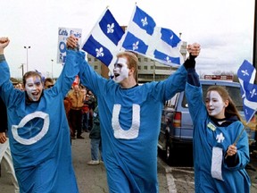 Young "YES" supporters, wearing frocks with the French word "OUI", walk outside a rally in Quebec City, in this October 29, 1995 file picture. Canada marked 20 years since the 1995 referendum on Quebec independence, last week, and 1995 also marked the emergence of Generation Z. REUTERS/Shaun Best/Files