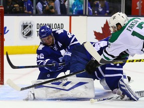 Maple Leafs' Tyler Bozak and goaltender James Reimer stop Dallas Stars' Radek Faksa during Monday's game at the Air Canada Centre. (DAVE ABEL/TORONTO SUN)