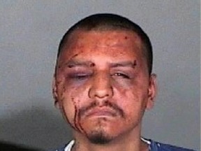 This undated evidence file photo provided by the U.S. Attorney's Office and taken by the Los Angeles County Sheriff's Department shows Gabriel Carrillo in Los Angeles. The former Los Angeles County sheriff's deputy convicted in the beating of Carrillo, a jail visitor who was handcuffed and assaulted by several deputies, is set to be sentenced in federal court. Sgt. Eric Gonzalez was sentenced to eight years in prison for deprivation of civil rights, conspiracy to violate constitutional rights and falsification of records. (Los Angeles County Sheriff's Department via AP, File)