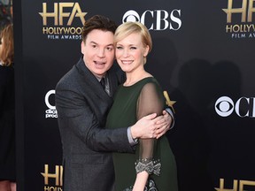 In this Nov. 14, 2014, file photo, Mike Myers, left, and Kelly Tisdale arrive at the Hollywood Film Awards at the Palladium in Los Angeles. (Photo by Jordan Strauss/Invision/AP, FIle)