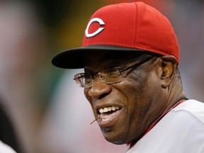 This Sept. 20, 2013,  file photo, shows then-Cincinnati Reds manager Dusty Baker in the dugout before a game against the Pittsburgh Pirates in Pittsburgh. (AP Photo/Gene J. Puskar, File)