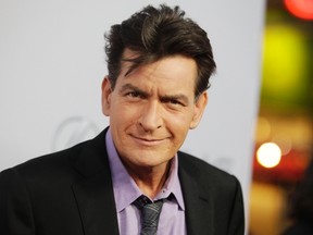 Cast member Charlie Sheen poses at the premiere of his new film "Scary Movie 5" in Hollywood April 11, 2013.
REUTERS/Fred Prouser