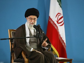 In this picture released by the official website of the office of Iranian supreme leader, Ayatollah Ali Khamenei speaks during a meeting with students in Tehran, Iran, Tuesday, Nov. 3, 2015. Iran's supreme leader says the slogan "Death to America" is not aimed at the American people, but rather American policies. (Office of the Iranian Supreme Leader via AP)