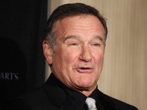 Actor Robin Williams poses as he arrives at the British Academy of Film and Television Arts Los Angeles Britannia Awards in Beverly Hills, California in this November 30, 2011 file photo. REUTERS/Fred Prouser/Files