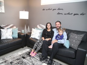 Lynn and Ryan Vis with their 18-month-old daughter Lily at their home at 2490 Fournier Drive in Val Caron,. The Vis Family lives in a beautiful new home designed and built by them on a quiet street in Val Caron. Gino Donato/Sudbury Star/Postmedia Network