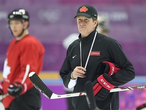 Team Canada head coach Mike Babcock during hockey practice at the Olympics in Sochi, Russia, on Feb. 11, 2014. (Al Charest/Calgary Sun)