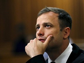 Olympic and Paralympic track star Oscar Pistorius, freed on parole in October after serving one-fifth of his prison term for killing his girlfriend Reeva Steenkamp, faces years more in jail if state lawyers can get his conviction scaled up to culpable homicide from murder. (Siphiwe Sibeko/Reuters/Files)