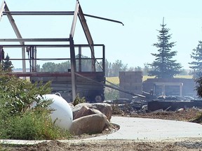 A home that burned down in a deadly fire south of Platte, S.D. Authorities say Tuesday, Sept. 22, 2015 they believe a man fatally shot his wife and four children, set their rural South Dakota house on fire, then turned the shotgun on himself. (KELO-TV via AP, File)