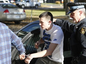 Kyle Robert Clermont, 20, of Ottawa is taken into Brockville court on Tuesday, Nov. 3, 2015. Clermont is charged with committing an indignity to a body and conspiracy to commit an indictable offence related to the death of Deepak Beaudoin-Reichmann. (MATT DAY/OTTAWA SUN/POSTMEDIA NETWORK)