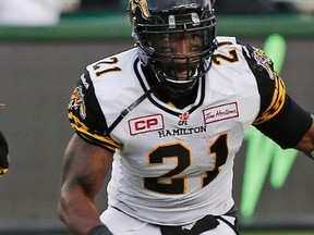 Don't expect an apology coming from Tiger-Cats defender Simoni Lawrence for his hit on RedBlacks quarterback Henry Burris. (Perry Nelson/Postmedia Network)