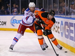 Sean Couturier suffered a concussion after taking a high hit Oct. 21 by former teammate Zac Rinaldo of the Boston Bruins. (USA TODAY SPORTS)