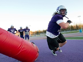 Western Mustangs defensive lineman Andrew Pedda runs a drill during practice at TD Stadium on Tuesday. The Mustangs host the Laurier Golden Hawks Saturday in an OUA football semifinal game at TD Stadium at 1 p.m. (CRAIG GLOVER, The London Free Press)