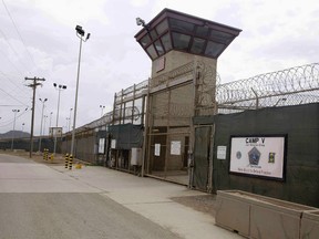 In this June 7, 2014 file photo, the entrance to Camp 5 and Camp 6 at the U.S. military's Guantanamo Bay detention center, at Guantanamo Bay Naval Base, Cuba.  (AP Photo/Ben Fox, File)