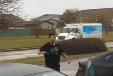 Police are asking for the public's help to identify a man wanted in connection with a reported vehicle robbery. 
The vehicle robbery took place Oct. 28 at 2:30 p.m. in the 1100-block of Keewatin Street. 
Surveillance images show a male wanted in relation to the incident. 
The male is described as about 17, aboriginal in appearance and 5-foot-7 with an average build. He has short, spiked black hair and was wearing dark jeans and a black T-shirt with a rip in the left chest area.