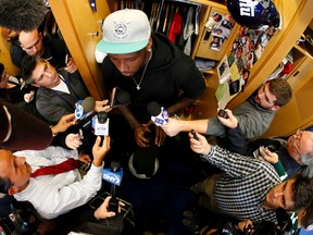 New York Giants defensive end Jason Pierre-Paul speaks to reporters for the first time since injuring his right hand during NFL football practice, Friday, Oct. 30, 2015, in East Rutherford, N.J. Pierre-Paul hurt his hand while blowing up fireworks during July 4th celebrations. (AP Photo/Julio Cortez)
