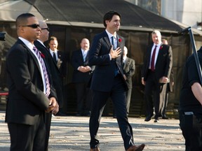 Prime Minister Justin Trudeau (and his brown shoes) acknowledges members of the public as he makes his way to a news conference with his cabinet after the swearing-in ceremony at Rideau Hall on Wednesday, November 4, 2015.
THE CANADIAN PRESS/Fred Chartrand