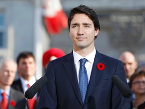 Prime Minister Justin Trudeau speaks to the crowds outside Rideau Hall after the Cabinet's swearing-in ceremony in Ottawa November 4, 2015. REUTERS/Blair Gable