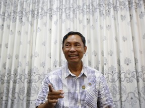 Former Myanmar ruling party chief Shwe Mann reacts during a Reuters interview at his residence in Phyu, Myanmar, November 4, 2015. One of Myanmar's most powerful politicians, ousted as leader of the ruling party in August, said Aung San Suu Kyi's opposition party was the most popular in the country and he would work with the Nobel laureate in parliament after an historic election. Shwe Mann leads a sizeable parliamentary faction of the ruling Union Solidarity and Development Party (USDP). If Suu Kyi fails to win a majority, support from one of the former top generals in the junta could help her form a government.  REUTERS/Olivia Harris