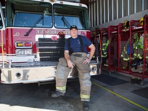 Farmer Tim Churchill was the first Thames Centre volunteer firefighter to get to a house fire and couldn?t wait for safety gear to try to find a woman inside. (DEREK RUTTAN, The London Free Press)