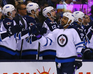 Dustin Byfuglien of the Winnipeg Jets celebrates his goal against the Toronto Maple Leafs during NHL action at the Air Canada Centre in Toronto on Wednesday November 4, 2015. Dave Abel/Toronto Sun/Postmedia Network