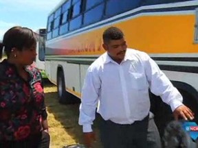 South African student Le-Aan Adonis, right, stole a bus in a desperate effort to get him and his classmates to their final year mathematics exams. (enca.com screengrab)