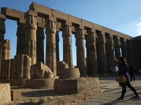 Tourists visit Luxor temple on the East Bank of Egypt's ancient city of Luxor on November 5, 2015.  AFP PHOTO / KHALED DESOUKI