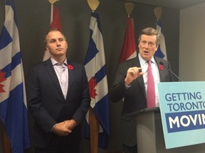 TTC chair Josh Colle and Mayor John Tory speak to reporters at City Hall on Thursday, Nov. 5, 2015. (DON PEAT/Toronto Sun)