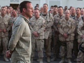 Former Minister of National Defence Peter MacKay is seen here addressing Canadian troops during a military ceremony on Kandahar Air Field (KAF) in the province of Kandahar, in Afghanistan, on July 2, 2011. Philippe-Olivier Contant/Postmedia Network