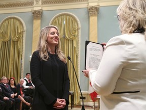 Canada's new Heritage Minister Melanie Joly is sworn-in during a ceremony at Rideau Hall in Ottawa November 4, 2015. REUTERS/Chris Wattie
