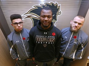 University of Manitoba Bisons Canada West football all-stars Jamel Lyles, David Onyemata and Evan Foster (from left) are pictured on Thu., Nov. 5, 2015. Kevin King/Winnipeg Sun/Postmedia Network