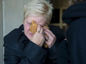 Ivana Broz uses her son?s favourite childhood toy, a stuffed bear named Fuzz, to wipe away tears after Elton Sabino was sentenced in London Thursday to two years less a day for dangerous driving in a January Western University campus crash that killed Broz?s son, Jan. (DEREK RUTTAN, The London Free Press)