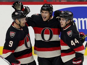 The Ottawa Senators took on the Winnipeg Jets at Canadian Tire Centre in Ottawa Ontario Thursday Nov 5, 2015. Senators Cody Ceci celebrates with his teammates Milan Michalek and Jean-Gabriel Pageau after scoring on the Jets during first period action Thursday. Tony Caldwell/Ottawa Sun/Postmedia Network