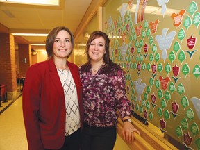 Cancer survivors Paulette Lalancette, left, co-chair of the Northeast Cancer Centre Patient and Family Advisory Council, and Lianne Dupras, a member of the council, were on hand for a ceremony at the centre to mark the 25th anniversary of the facility in Sudbury, Ont. on Thursday November 5, 2015. The centre treated its first radiation patient on Nov. 5, 1990. John Lappa/Sudbury Star/Postmedia Network