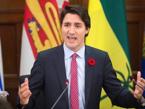 Prime Minister Justin Trudeau delivers some opening remarks at the start of caucus in Ottawa on Nov. 5, 2015. (THE CANADIAN PRESS/Adrian Wyld)