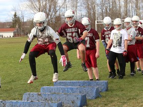 The St. Charles Cardinals junior boys' football team ran through some drills at the school field Friday afternoon ahead of Saturday's NOSSA final at James Jerome Sports Complex at 11 a.m.