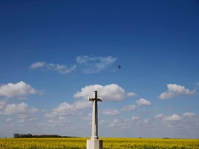 The Canadian cemetery is seen in the middle of a field at Tilloy-les-Cambrai, northern France April 5, 2014. REUTERS/Pascal Rossignol