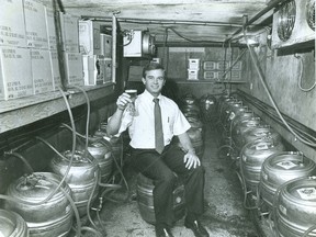 Paul McCart, manager of The Ceeps shows kegs of beer stored in the basement, Sept. 1, 1987. (London Free Press files)