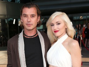 In this June 4, 2013 file photo, musicians Gavin Rossdale, left, and Gwen Stefani attend the LA premiere of "The Bling Ring" in Los Angeles. Stefani and Rossdale have filed for divorce after 12 years of marriage. Los Angeles Superior Court spokeswoman Mary Hearn says Stefani filed her petition Monday, Aug. 3, 2015, and Rossdale filed a response shortly thereafter. Stefani cited irreconcilable differences for the breakup and both are seeking joint custody of their three children.  (Photo by Todd Williamson/Invision/AP, File)