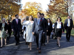 Incoming Prime Minister Justin Trudeau and his wife Sophie Gregoire arrive with his cabinet before his swearing-in ceremony at Rideau Hall in Ottawa, Canada Nov. 4, 2015. (REUTERS/Chris Wattie)