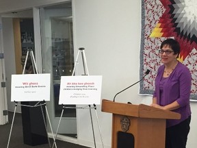 Coun. Jenny Gerbasi celebrates the renaming of the aboriginal resources area at Millennium Library Saturday, Nov. 7, 2015.