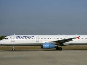 The Metrojet's Airbus A-321 with registration number EI-ETJ that crashed in Egypt's Sinai peninsula, is seen in this picture taken in Antalya, Turkey September 17, 2015. The Russian airliner carrying 224 passengers and crew crashed in Egypt's Sinai peninsula on October 31, 2015, the Egyptian civil aviation authority said, and a security officer who arrived on the scene said all aboard the plane were probably dead. The Airbus A-321, operated by Russian airline Kogalymavia with the flight number 7K9268, was flying from the Sinai Red Sea resort of Sharm el-Sheikh to St Petersburg in Russia when it went down in a desolate mountainous area of central Sinai soon after daybreak, the aviation ministry said. Picture taken September 17, 2015. (REUTERS/Kim Philipp Piskol)