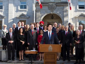 Prime Minister Justin Trudeau holds a news conference with his cabinet after they were sworn-in at Rideau Hall, the official residence of Governor General David Johnston, in Ottawa Wednesday, November 4, 2015. THE CANADIAN PRESS/Fred Chartrand