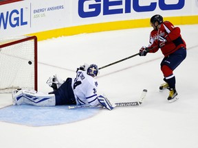 Washington Capitals left winger Alex Ovechkin scores the winning goal past Toronto Maple Leafs goalie James Reimer in a shootout on Saturday, Nov. 7, 2015, in Washington. (AP/Alex Brandon)