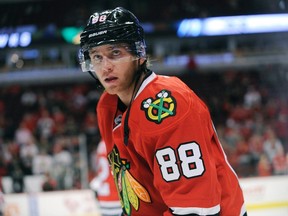 Chicago Blackhawks Patrick Kane (88) warms up before a pre-season NHL hockey game against the Detroit Red Wings in Chicago, Tuesday, Sept. 22, 2015. Kane is one of the storylines ahead of the 2015-16 NHL season.THE CANADIAN PRESS/ AP/David Banks