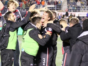 Furywin2: Fury FC defender Mason Trafford (3), celebrates with teammates and fans after defeating Minnesota United FC in the NASL Championship semi-final at TD Place on Sunday, Nov. 8, 2015. (Chris Hofley/Ottawa Sun)