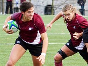 Cindy Nelles (with ball) and Katie Svoboda, both of Belleville, helped the McMaster Marauders win the CIS women's rugby crown Sunday in Kingston. (Submitted photo)