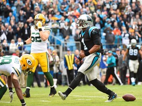 Nov 8, 2015; Charlotte, NC, USA; Carolina Panthers quarterback Cam Newton (1) reacts in the first quarter at Bank of America Stadium. Mandatory Credit: Bob Donnan-USA TODAY Sports