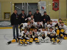 Members of the Mitchell Pee Wee AE's celebrate their championship in the St. Marys tournament Sunday, Nov. 8. The squad edged Pelham 2-1 in an exciting shootout. SUBMITTED